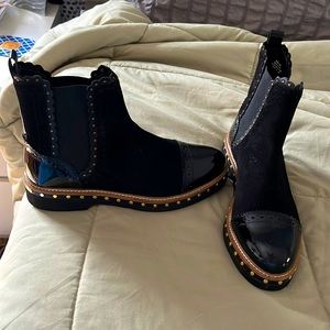 Black Steve Madden ankle boots.